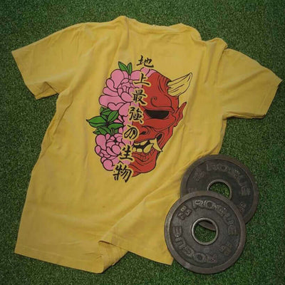 Baki-Inspired anime shirt with a yokai/flower print on a yellow shirt