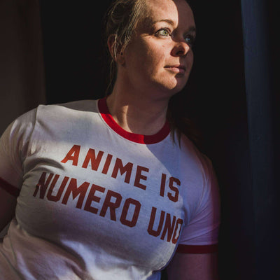 Athlete wearing Anime is Numero Uno t-shirt